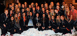 The Auburn equestrian team and coaches pose for the camera after celebrating their 2013 National Collegiate Equestrian Association Championship with what truly was the last rolling of the oaks at Toomer’s Corner on April 21