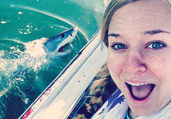 Riley Shugg snaps a selfie with a shark